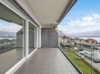 Enjoy breathtaking views from this stunning balcony! This property features a modern design with large windows and a spacious outdoor area.