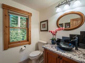 This stunning bathroom boasts a luxurious feel with its elegant design and high-end finishes.