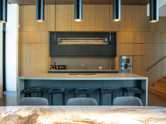 This modern kitchen boasts sleek design and high-end finishes.