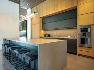 This modern kitchen boasts sleek design and high-end appliances.