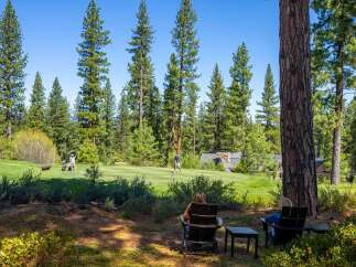 Enjoy the tranquility of this stunning property with breathtaking views of a lush golf course.