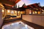 Experience ultimate relaxation in this stunning modern home featuring a luxurious outdoor hot tub perfect for unwinding under the stars.