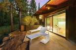 Experience luxury living with this stunning modern home featuring a spacious patio perfect for relaxation and entertaining.