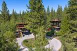 Nestled amidst a serene forest, this modern architectural masterpiece offers a luxurious retreat.