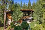 Experience modern mountain living in this stunning architectural home nestled amongst towering pine trees.