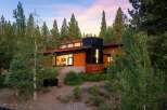 Experience modern mountain living in this stunning architectural home nestled amongst mature trees.