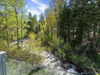 Experience the tranquility of nature from this stunning property.