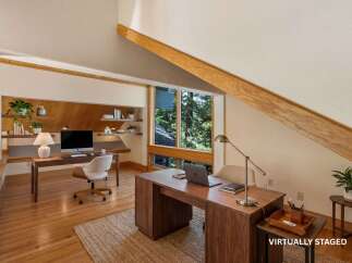 Discover the perfect blend of modern design and natural light in this stunning home office.