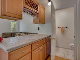 This charming property boasts a stylish bar area, perfect for entertaining guests.