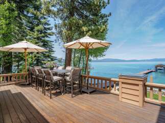 Enjoy breathtaking lake views from this stunning outdoor deck.