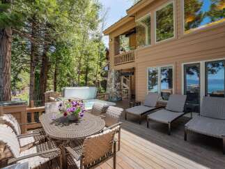 Enjoy luxurious outdoor living in this stunning property, featuring a spacious deck perfect for entertaining.