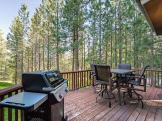 Enjoy outdoor living at its finest on this beautiful deck! This property features a spacious deck perfect for entertaining or relaxing.