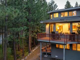 Nestled amidst a lush forest, this stunning property offers a serene retreat.