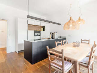 Experience modern living in this beautifully appointed kitchen and dining area.