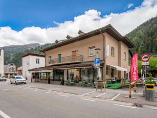 Discover this charming commercial property located in a picturesque mountain town, perfect for a restaurant or bar.