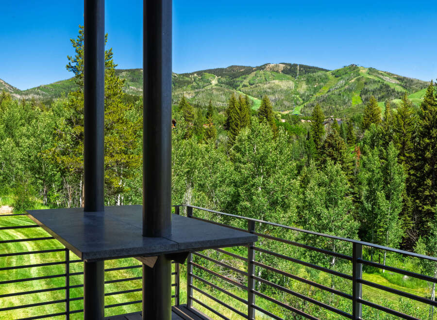Experience breathtaking mountain views from this stunning property, featuring a spacious balcony perfect for enjoying the serene landscape.