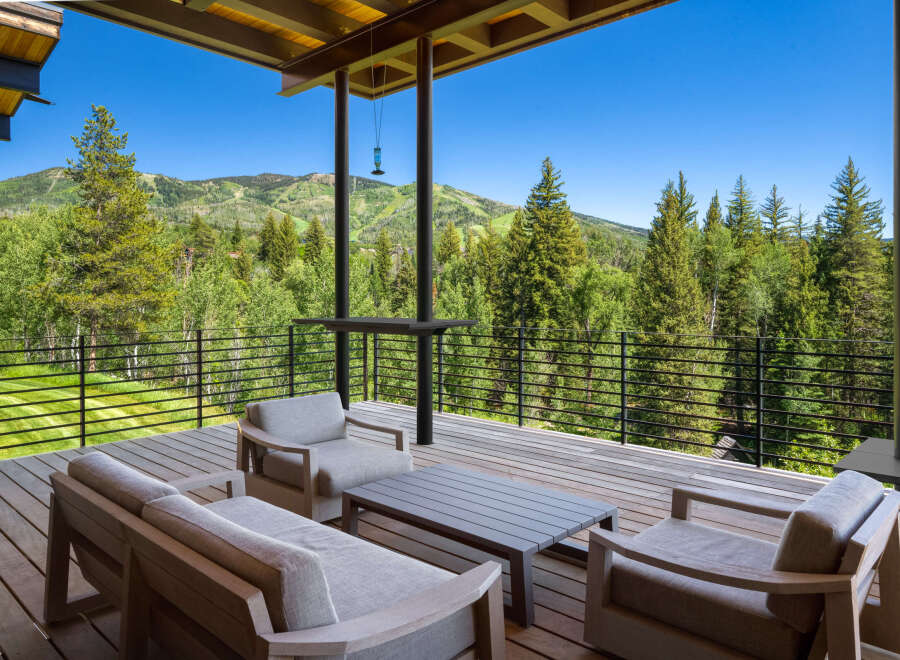 Experience breathtaking mountain views from this stunning deck, perfect for outdoor living and entertaining.