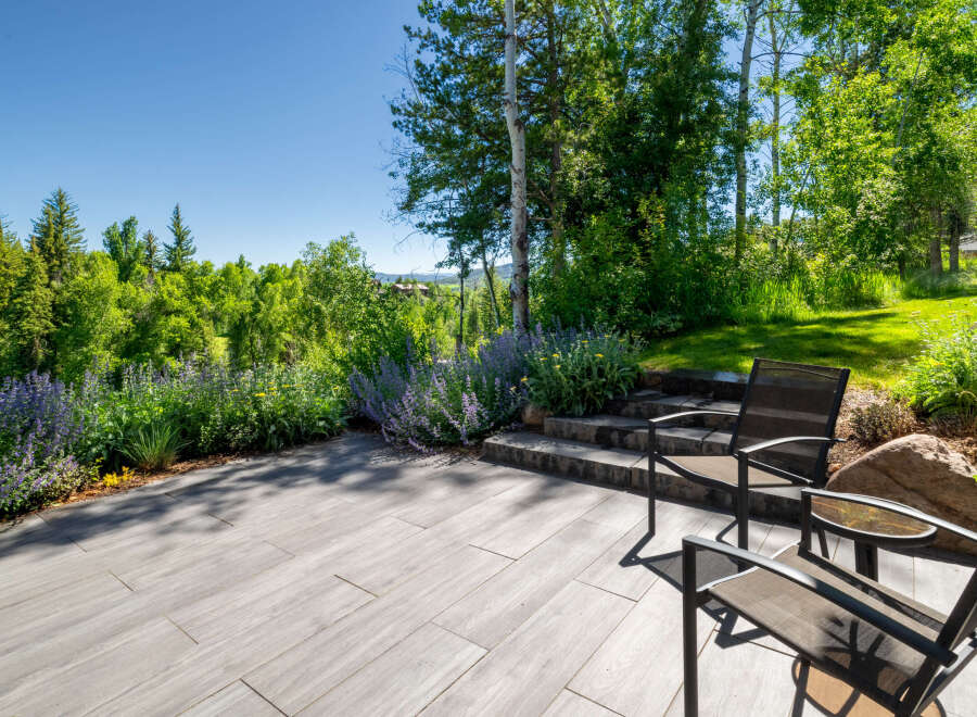Enjoy the serene mountain views from this beautiful patio, perfect for outdoor entertaining.