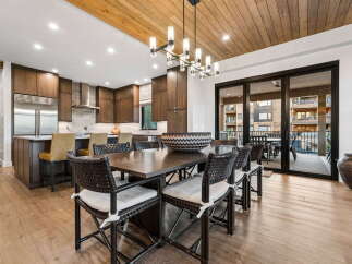 Experience modern living in this stunning open-concept dining and kitchen area, perfect for entertaining.