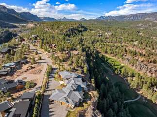 Experience luxury living nestled amidst a breathtaking mountain landscape with this stunning property.