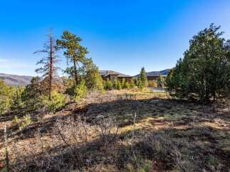 Nestled amidst a serene landscape, this property offers a tranquil retreat with stunning natural surroundings.