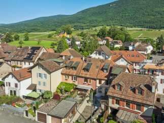 Discover this charming village home nestled amidst rolling green hills and vineyards.