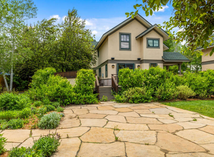 Discover this charming home featuring a beautiful flagstone patio perfect for outdoor entertaining.