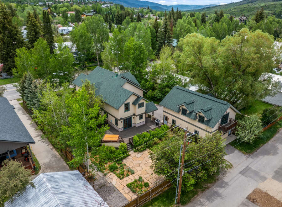 Discover this charming property featuring a spacious deck with a hot tub, perfect for relaxation and entertaining.