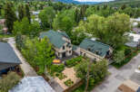 Discover this charming property featuring a spacious deck with a hot tub, perfect for relaxation and entertaining.