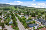 Discover this charming mountain town home, nestled amidst lush greenery and offering stunning views of the surrounding hills and ski slopes.