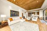 Experience luxurious open-concept living with a stunning longhorn artwork as the centerpiece of this spacious living area.