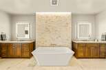 Experience luxury in this stunning master bathroom, featuring a freestanding soaking tub as the centerpiece.
