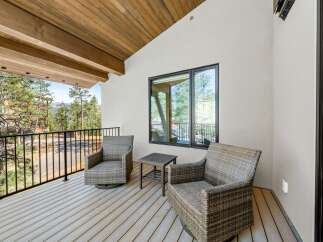 Enjoy breathtaking mountain views from this charming balcony, perfect for morning coffee or evening relaxation.