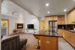 Cozy living space featuring a warm fireplace and a modern entertainment setup.