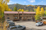 Experience mountain living in this charming apartment complex, perfect for outdoor enthusiasts.