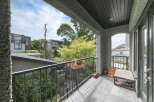 Enjoy outdoor living on this charming balcony, perfect for relaxing or entertaining.