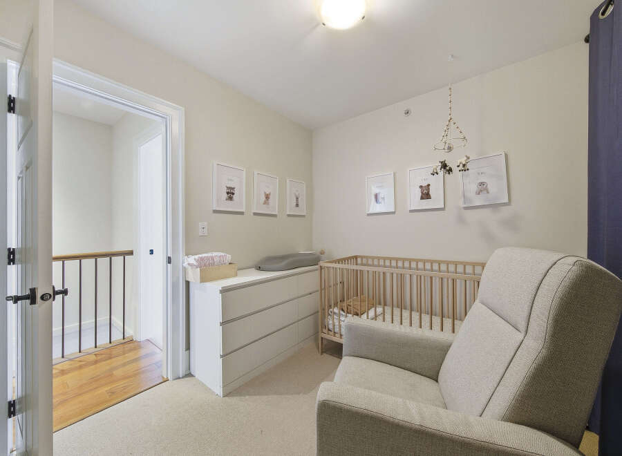 Welcome to this charming nursery, thoughtfully designed for comfort and style.