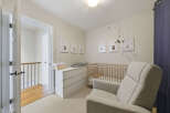 Welcome to this charming nursery, thoughtfully designed for comfort and style.