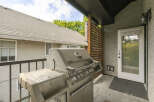 Enjoy outdoor living on this spacious balcony, perfect for entertaining guests.
