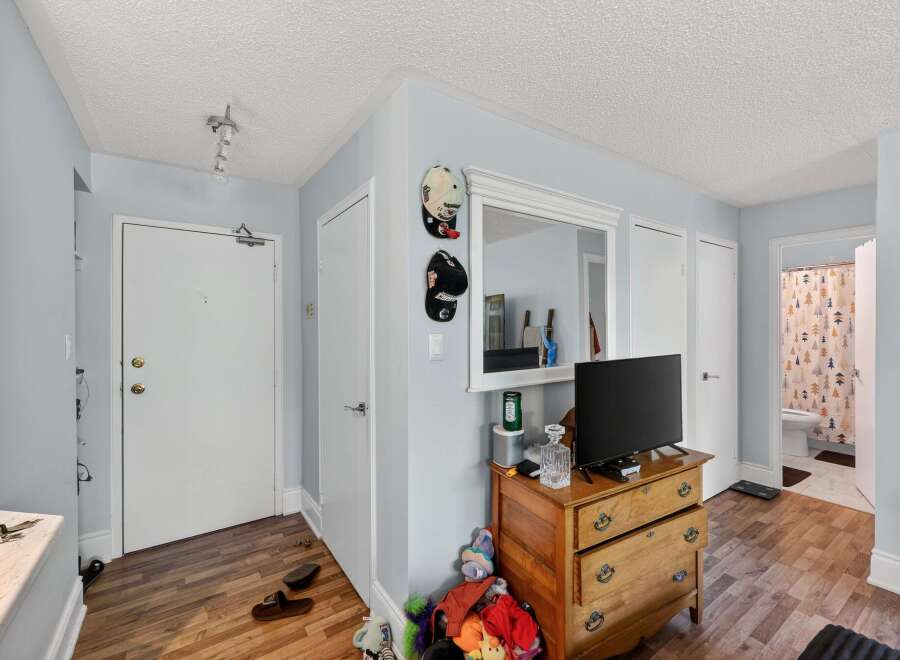 Discover this charming entryway featuring a spacious layout and convenient access to multiple doors.
