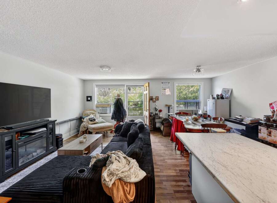 Discover this spacious open-concept living area, perfect for entertaining.