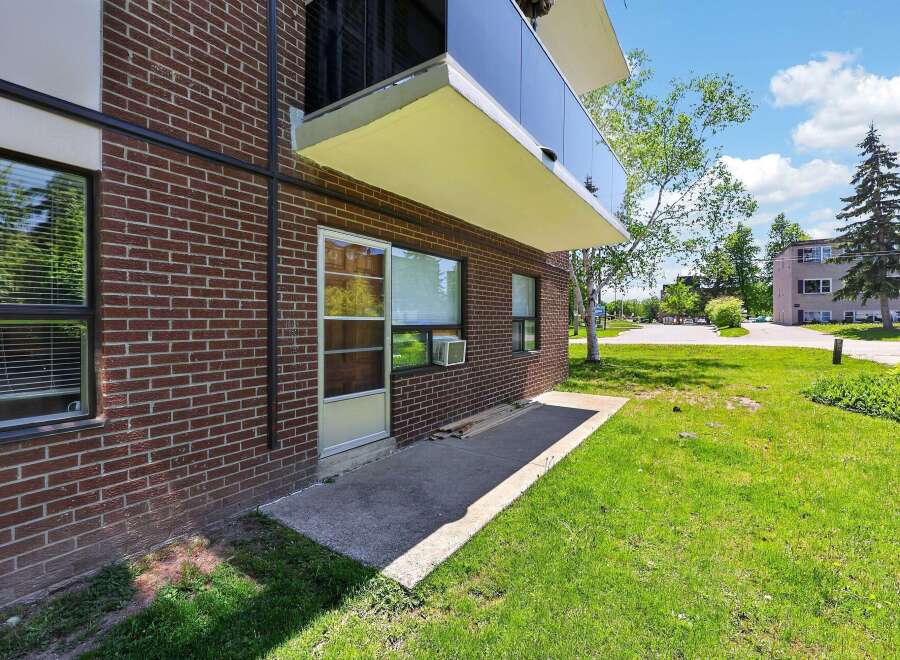 Discover comfortable living in this charming brick building, featuring a private balcony perfect for enjoying the outdoors.