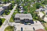Discover this charming brick apartment building nestled in a serene neighborhood.