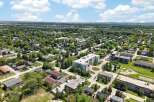Discover this vibrant community featuring a mix of single-family homes and multi-unit dwellings, perfect for diverse living needs.
