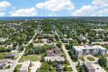 Discover this charming residential neighborhood with a mix of single-family homes and apartment buildings, perfect for families and professionals alike.
