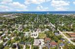 Discover this charming residential neighborhood with a mix of single-family homes and apartment buildings, perfect for families and individuals alike.
