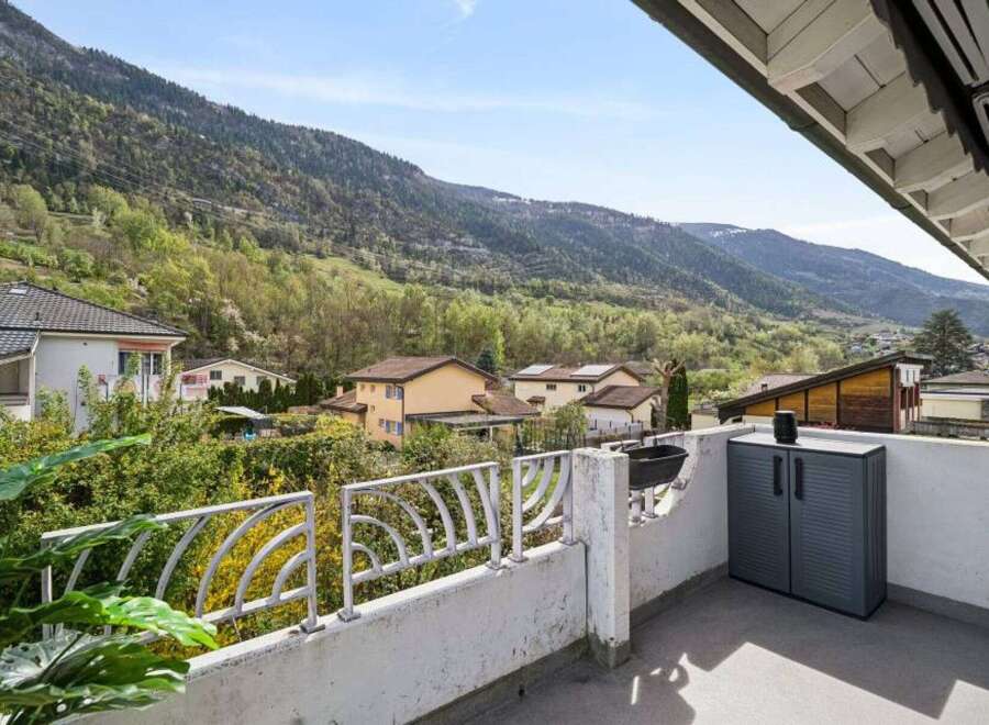 Enjoy breathtaking mountain views from this charming balcony, perfect for outdoor relaxation and entertaining.