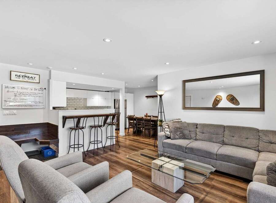 Experience modern living in this beautifully appointed condo, featuring a spacious open-concept layout perfect for entertaining.