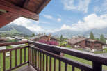 Experience breathtaking mountain views from this charming chalet-style property, perfect for a serene getaway.
