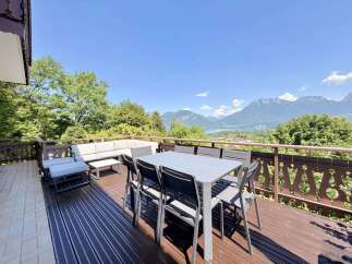 Enjoy breathtaking panoramic views from this stunning balcony, perfect for al fresco dining or relaxing with a view.